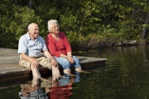 senior couple enjoying a day at the lake