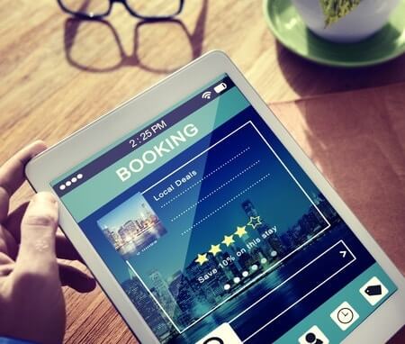 booking hotel on digital tablet app