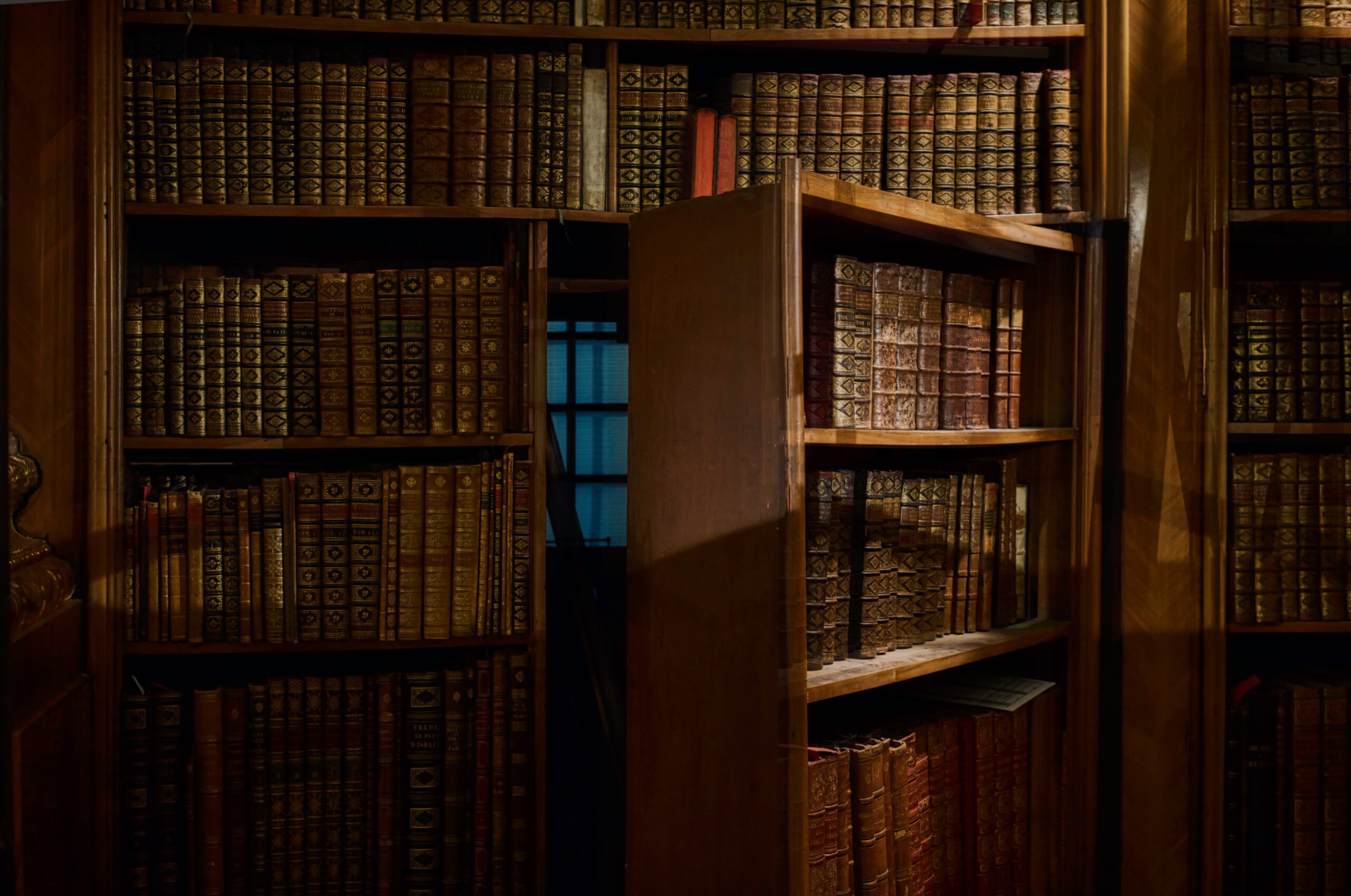 Hidden storage behind a bookcase